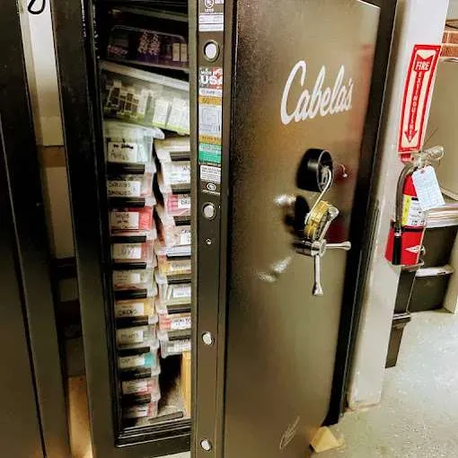 Cabela's gun safe with ammunition shelves inside.
