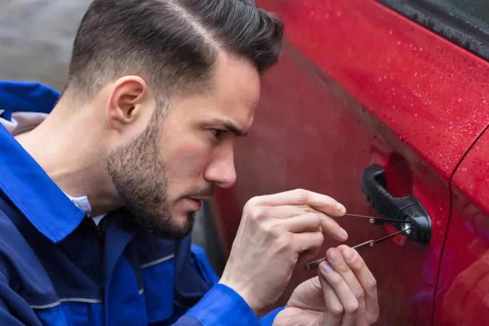 hero3 Locksmith picking car door lock.